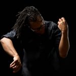 Clifton Harrison miming playing the viola