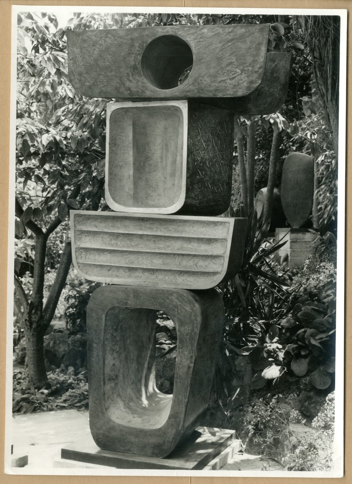 black and white photo of Family of Man in Barbara Hepworth’s garden, St. Ives