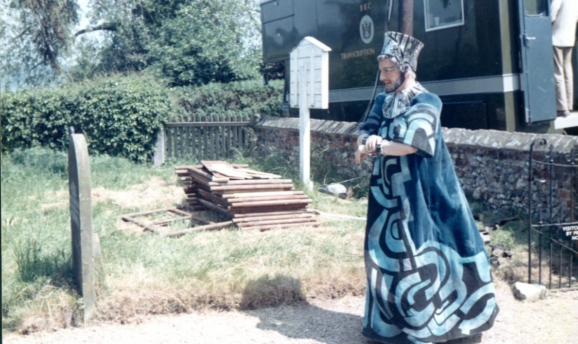 Photographs of performers, including Peter Pears, outside Blythburgh Church.