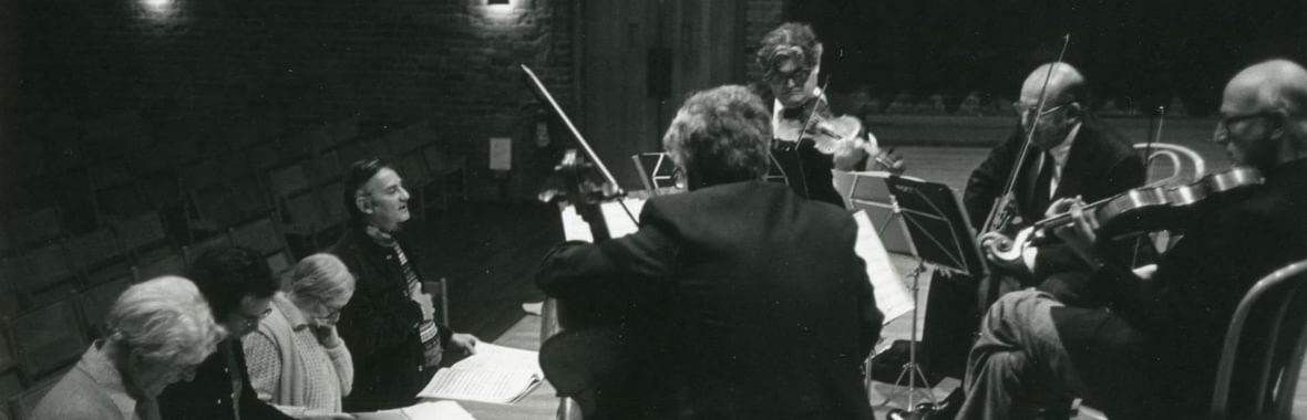 Peter Pears, Colin Matthews, Imogen Holst and Donald Mitchell with the Amadeus String Quartet during rehearsals for the premiere of Britten’s String Quartet No. 3, Snape Maltings, December 1976