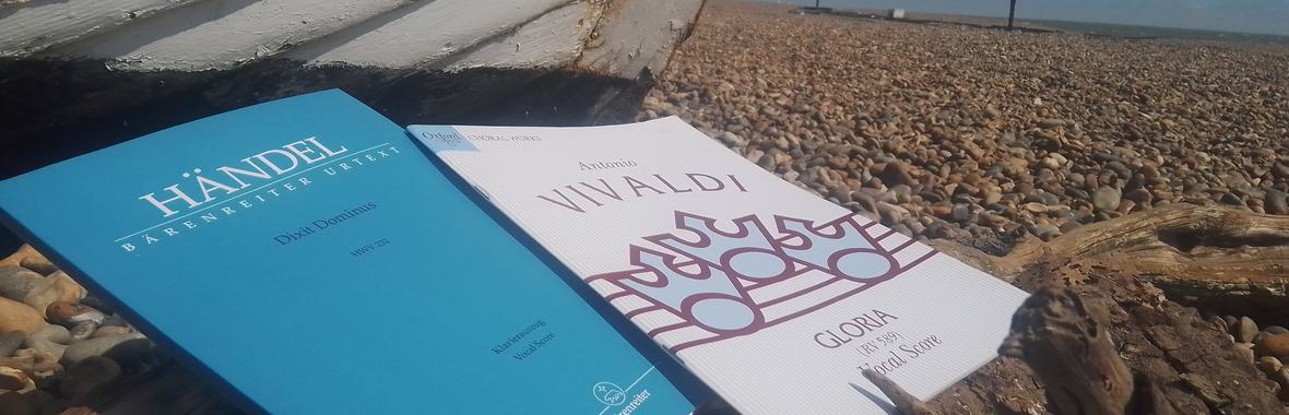 Handel and Vivaldi scores near a boat on Aldeburgh Beach.