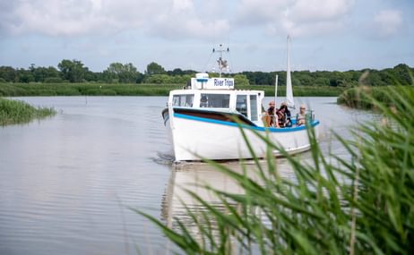 A boat on the river at Snape Maltings