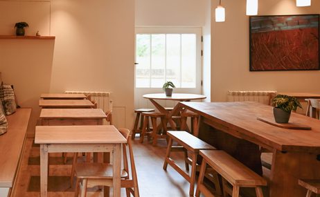 Tables, chairs and bench at Malt cafe