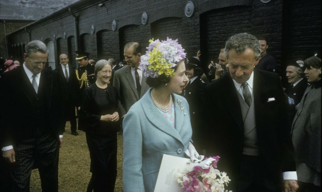 Her Majesty Queen Elizabeth II talks with Benjamin Britten, followed by Peter Pears, Imogen Holst and Prince Philip the Duke of Edinburgh during the official opening of the Snape Maltings Concert Hall, 2 June 1967.